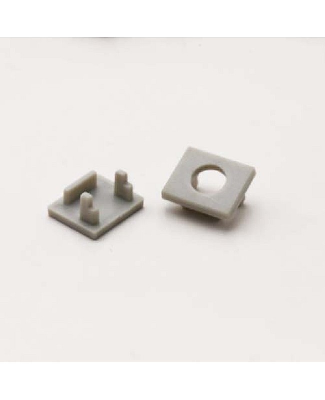 End caps for trimless LED lighting profiles for tiled walls