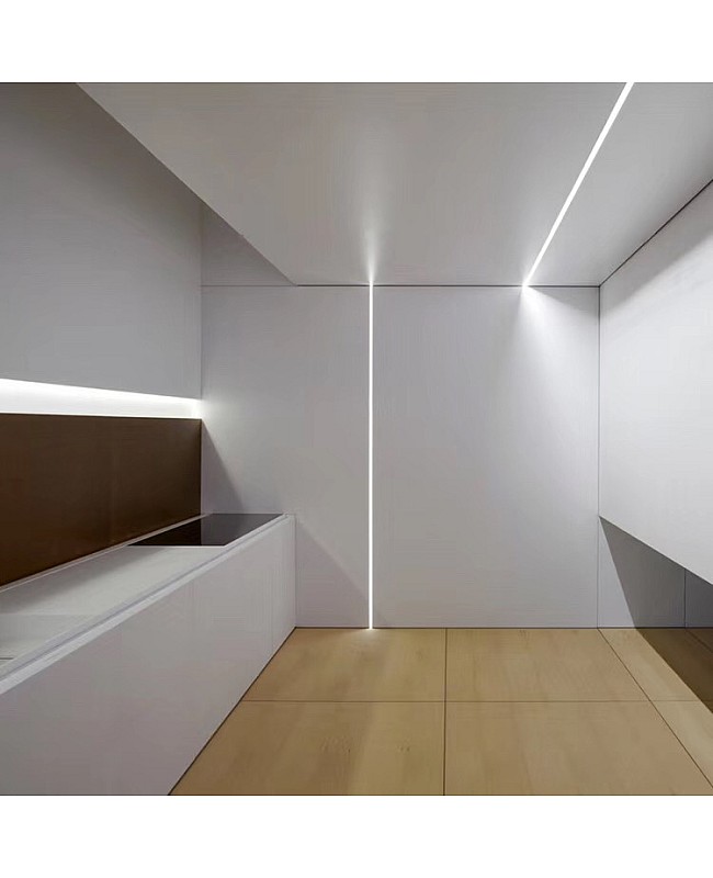 Tiled LED strip channels in kitchen
