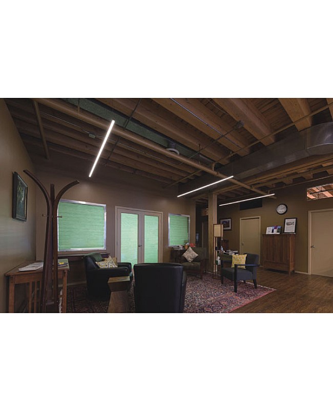 Round LED channels installed on the ceiling for task lighting in a living room